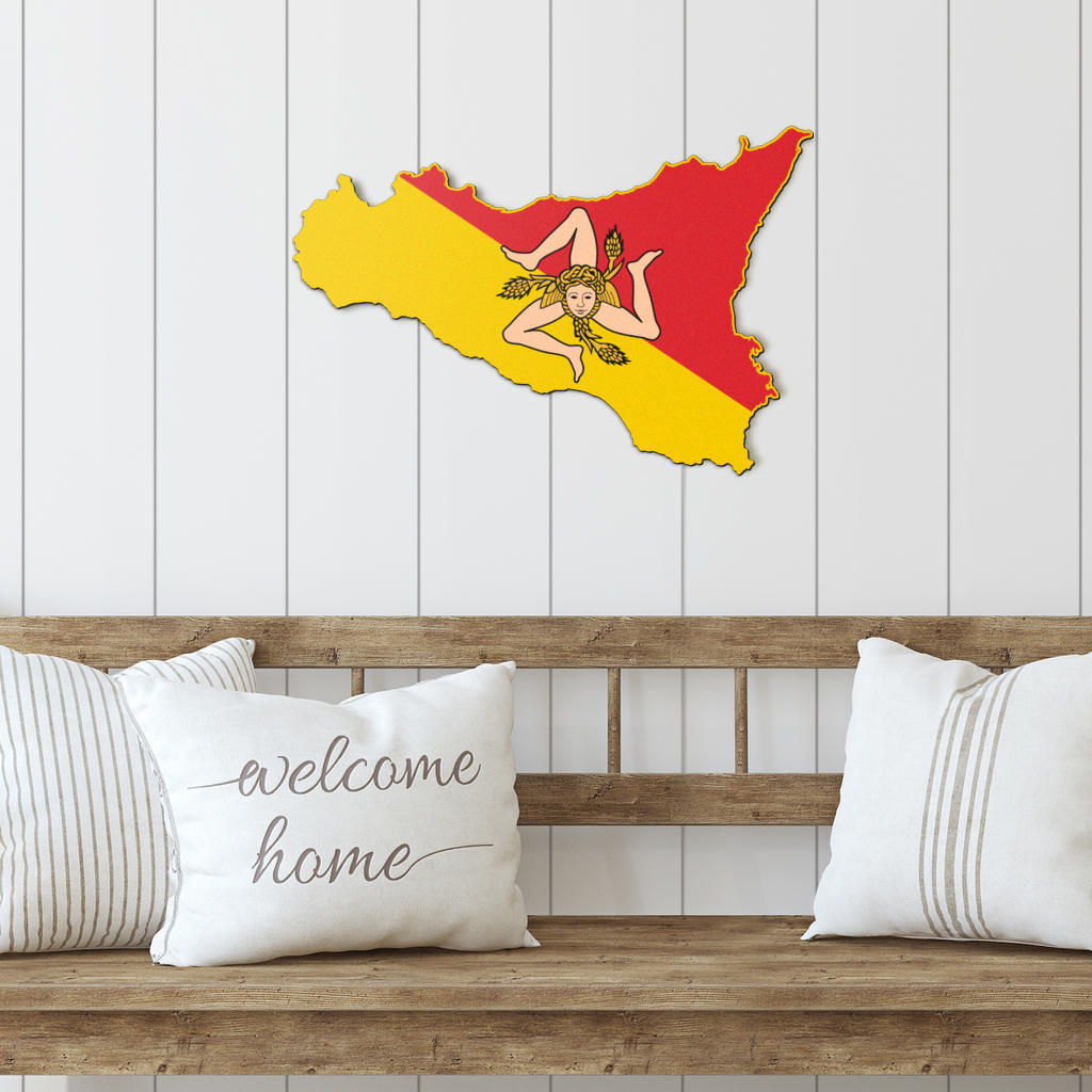 Sicily Map - Colored Metal Art displayed on a wooden bench with decorative pillows, showcasing intricate geography and elegance for indoor or outdoor decor.