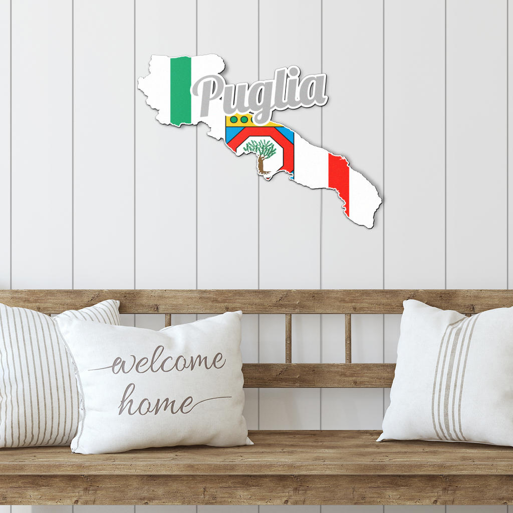 Apulia Map - Colored Metal Art displayed on a wooden bench with decorative pillows, highlighting Italian cultural elegance for both indoor and outdoor decor.