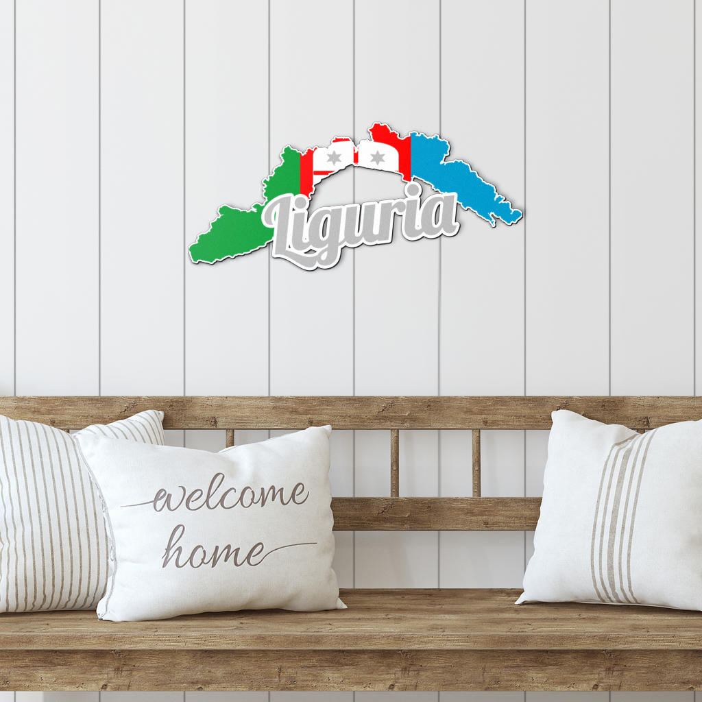 Liguria Map - Colored Metal Art displayed on a wooden bench with decorative pillows, showcasing its elegant design for enhancing interior or exterior spaces.