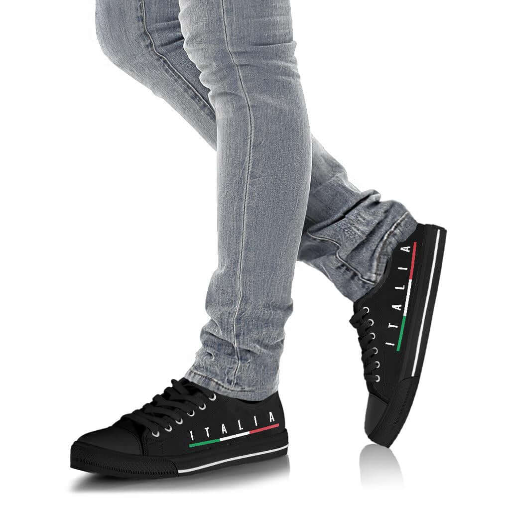 Italy Low-Top Shoes worn with jeans, featuring black canvas and laces, showcasing a trendy casual style.