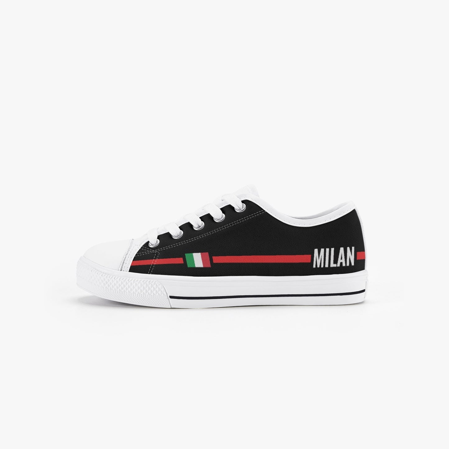 Kid’s Low-Top Shoes Milan, featuring a black and white design with red accents, rubber outsole, and canvas upper, ideal for children's casual wear.