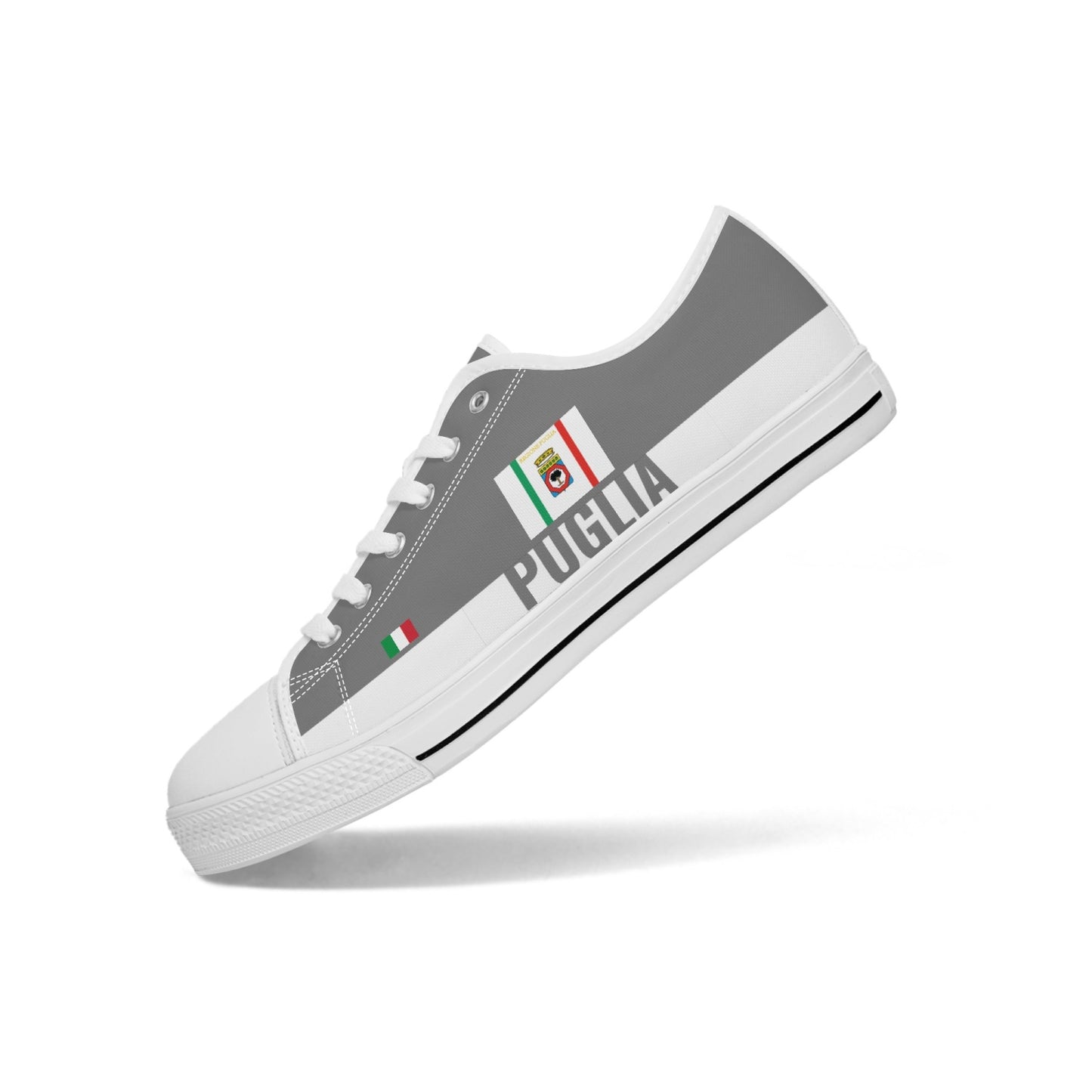 Puglia Shoes Low-top V2 featuring a grey and white design with canvas upper, rubber outsole, and metal eyelets, embodying a classic sneaker style.