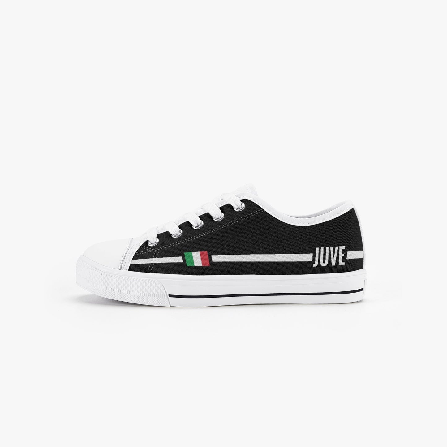 Kid’s Low-Top Shoes Juve featuring a black and white design with a side flag, canvas upper, rubber outsole, and lace-up closure.