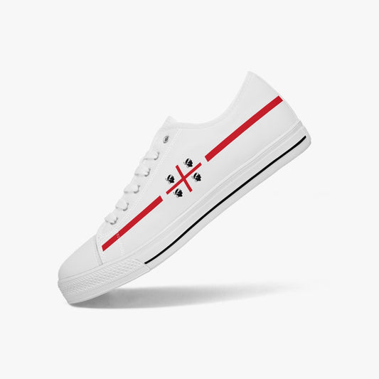 Low-Top Shoes Sardinia feature a white canvas design with red stripes, accented by a black and red cross, ideal for versatile, classic style.