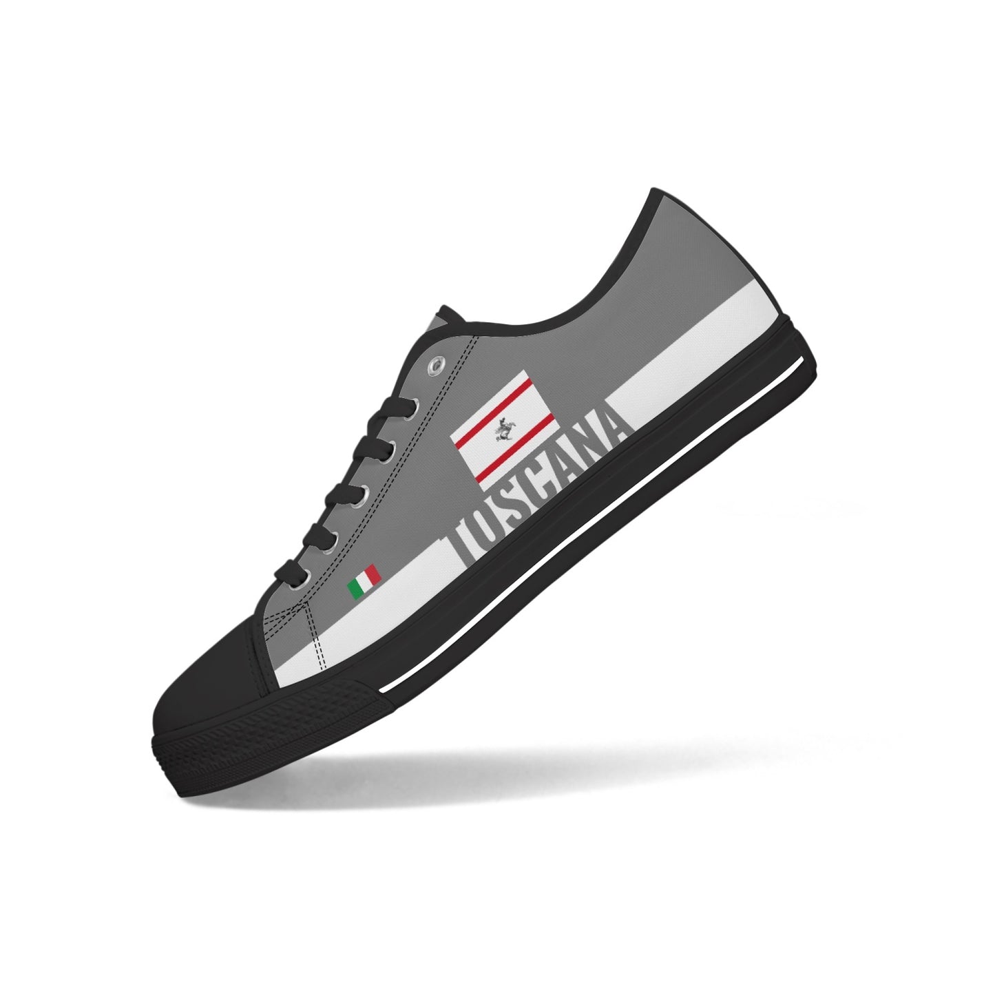 Toscana Shoes Low-top V2, featuring a grey and white design with a canvas upper, metal eyelets, and rubber outsole, highlighting classic sneaker style.