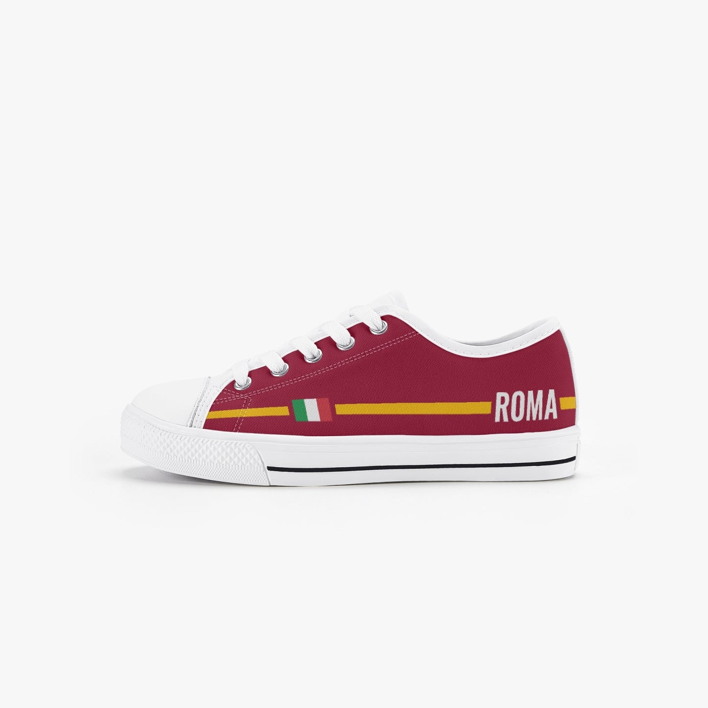 Kid’s Low-Top Shoes Roma featuring a canvas upper with metal eyelets and a lace-up closure, designed for kids with a soft rubber outsole.