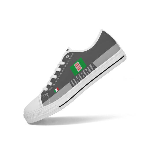 Umbria Shoes Low-top V2, featuring a grey canvas upper, white sole, rubber outsole, and lace-up closure, ideal for casual wear.