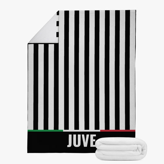 Juve Fleece Blanket with black and white stripes, featuring premium suede polyester for warmth and comfort, ideal for winter use and machine washable.